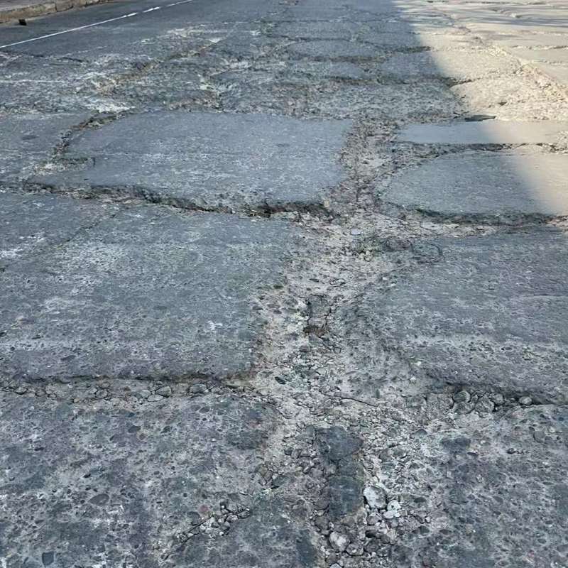 榕江路面起砂露石子修补料